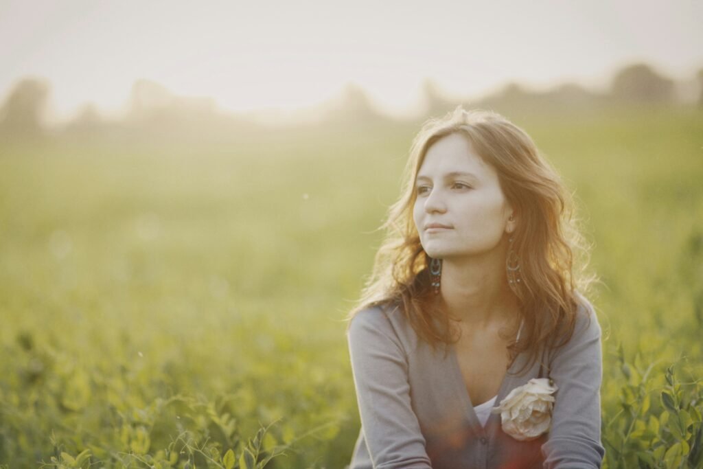 woman reflecting about pain and its cause