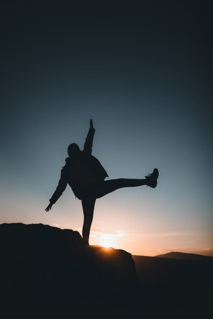 Person struggling to find emotional and energetic balance, representing signs of imbalance in the body